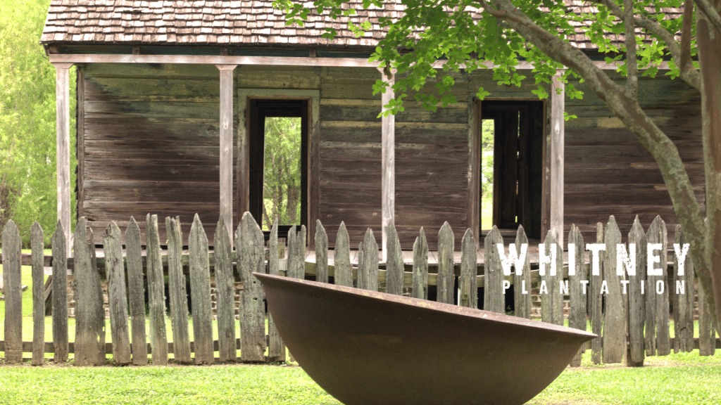 Slave cabin with sugar kettle in front